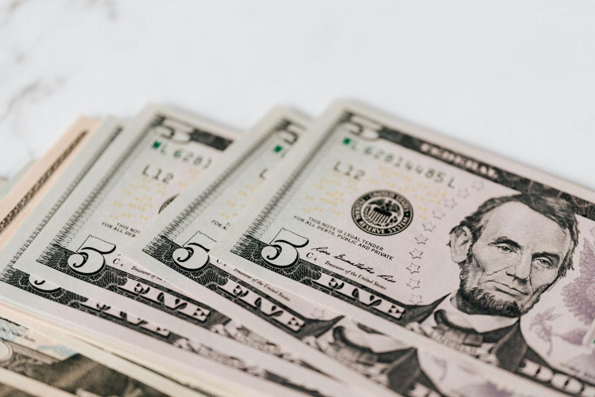 five dollar bills