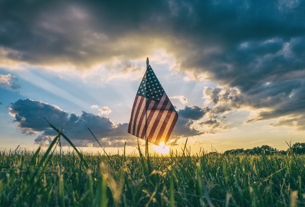 US flag over field