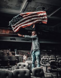 man holding flag