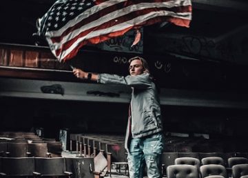 man holding flag