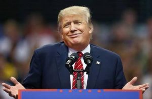 Trump shrugging
