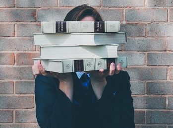 woman holding books