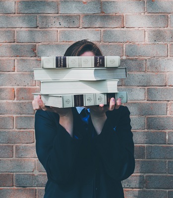 woman holding books