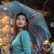 woman holding umbrella