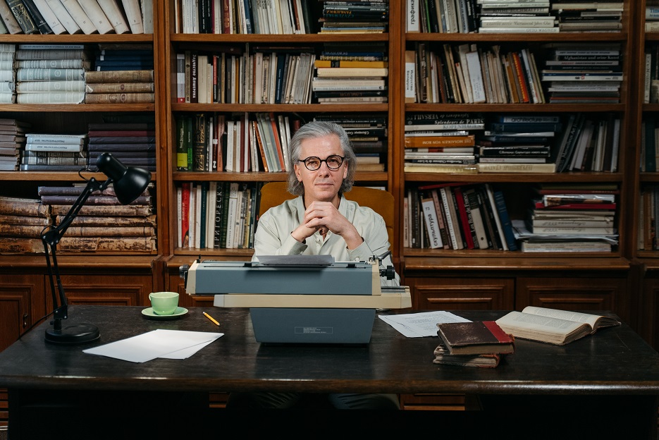 man sitting in library