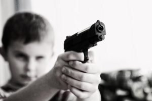 boy with toy gun
