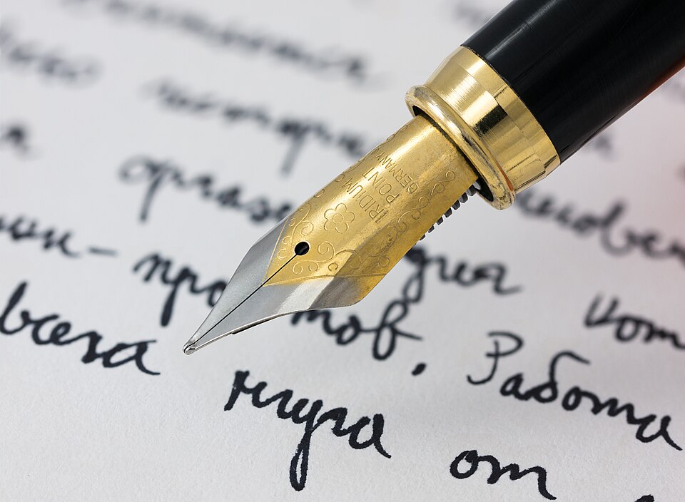 Close-up of traditional fountain pen with an iridium nib.